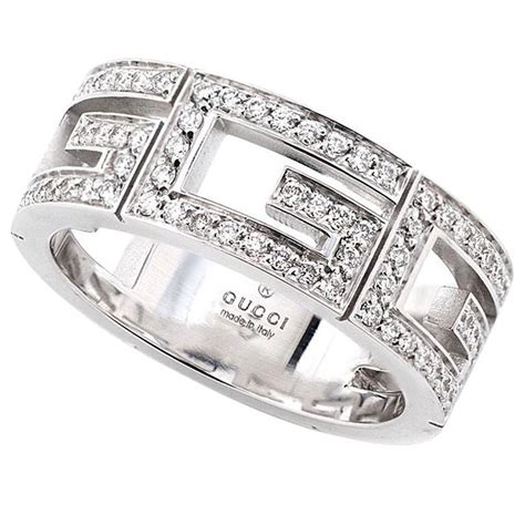 white and gold gucci ring
